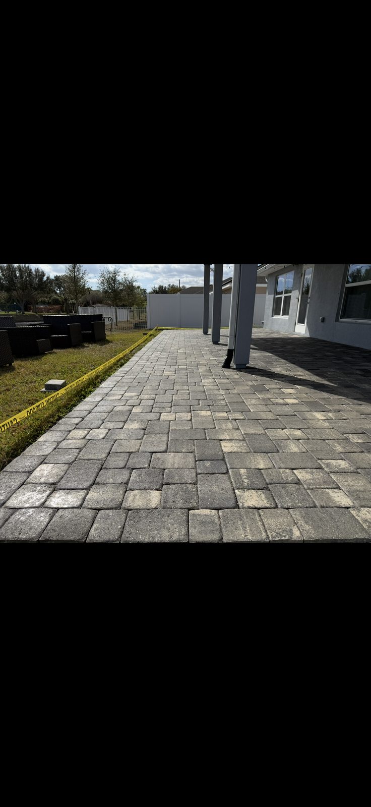 Freshly cleaned paver patio