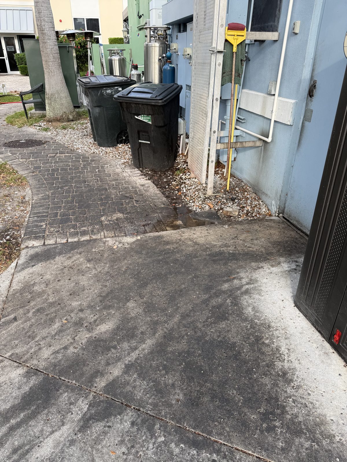 Utility & trash area — before